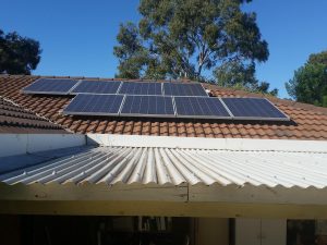 Renewable Energy and Green Technology solar panels, nature, photovoltaic cells, tiles, roof, tree